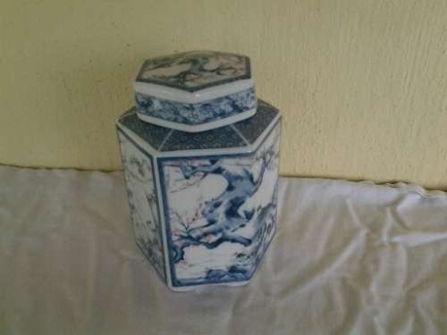 Nice blue and white oriental looking ginger jar with lid