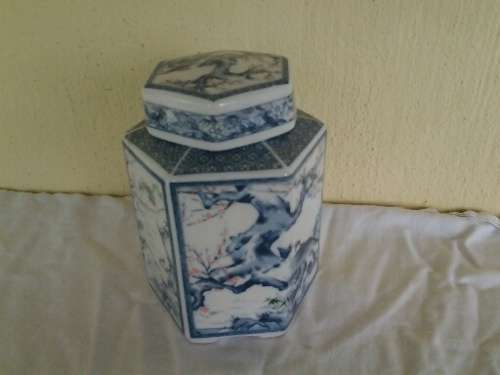 Nice blue and white oriental looking ginger jar with lid