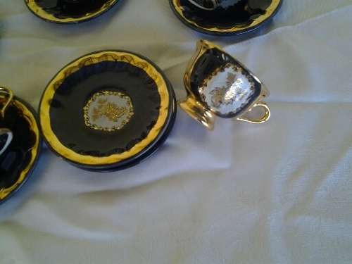 Pretty colt blue with gold floarl scene porcelain part coffee set