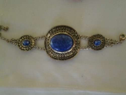 stunning costume bangle with blue semi precious looking stone