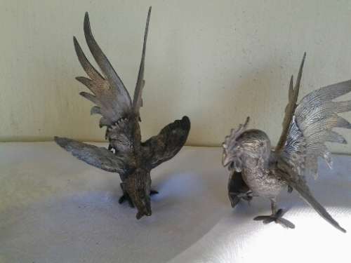 a pair of vintage sliver plated fighting roosters