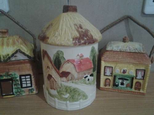 three nice vintage cottage scene biscuit barrels sold as one lot