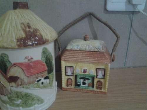 three nice vintage cottage scene biscuit barrels sold as one lot
