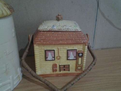 three nice vintage cottage scene biscuit barrels sold as one lot