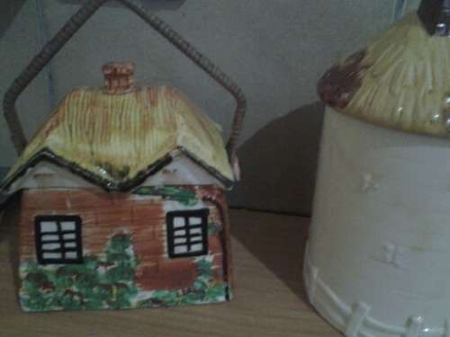 three nice vintage cottage scene biscuit barrels sold as one lot