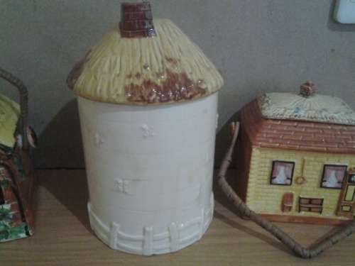three nice vintage cottage scene biscuit barrels sold as one lot