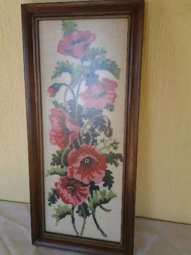 stunning wooden framed vintage red floral taper sty behind glass