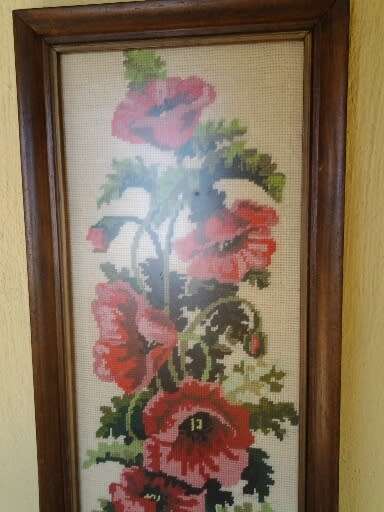 stunning wooden framed vintage red floral taper sty behind glass