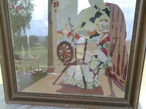 stunning vintage framed vintage scene of woman using her spiningwheel