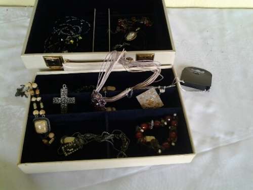vintage jewelry box case filled with some stunning costume jewelry