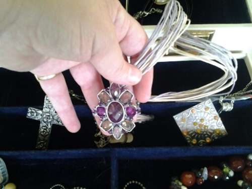 vintage jewelry box case filled with some stunning costume jewelry