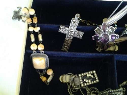 vintage jewelry box case filled with some stunning costume jewelry