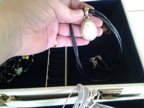 vintage jewelry box case filled with some stunning costume jewelry