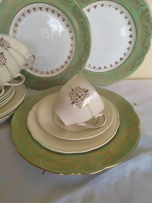 A job lot of five trios  and three dinner plates