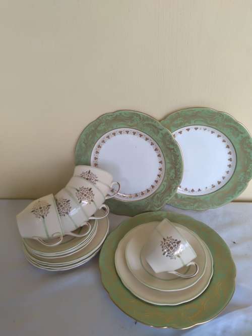 A job lot of five trios  and three dinner plates