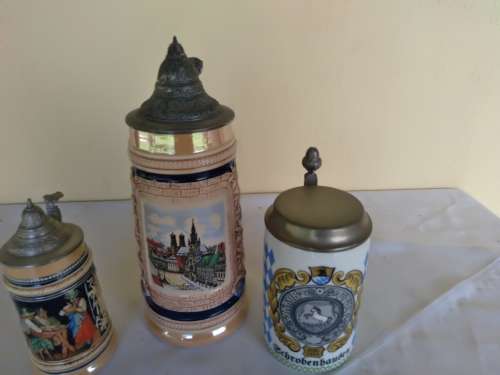 A lot of three collectable stain  mugs