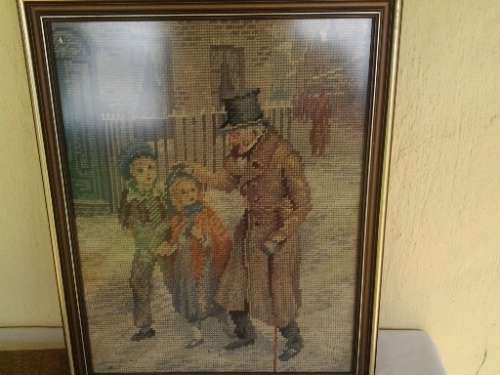 stunning vintage scene of a old man and two childern  tapestry framed behind glass