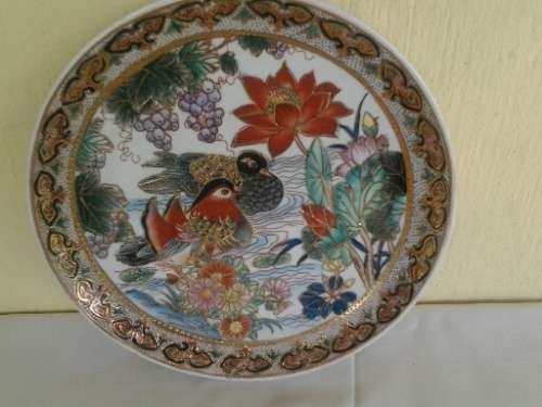stunning decorative oriental bird scene singed wall plate