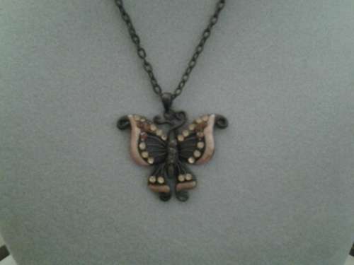 very pretty on a metal chain stunning costume butterfly pendant