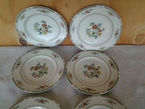 A set of eight pretty Floral pattern royal doulton Kingswood procelain side plates