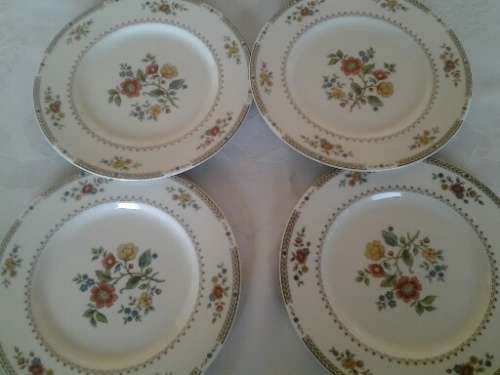 A set of eight pretty Floral pattern royal doulton Kingswood procelain side plates