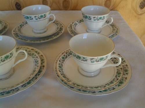 A set of six more modern porcelain tea cup trios