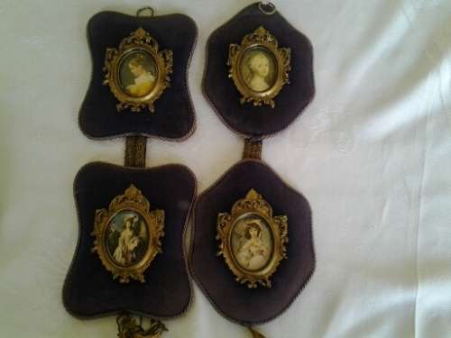 two vintage velvet wall hangings with small ornate frames