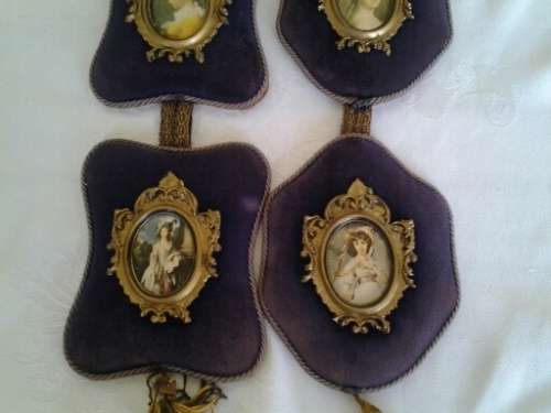 two vintage velvet wall hangings with small ornate frames