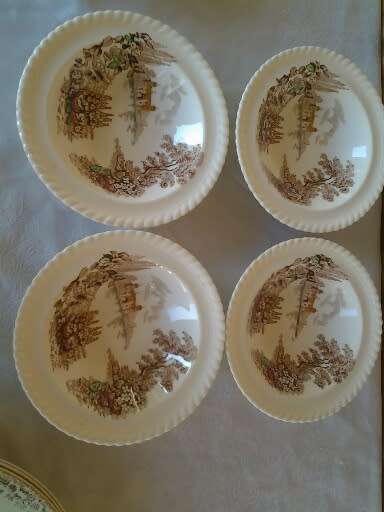 A lot of four porcelain pudding bowls castle on the lake scene by Johnson brothers