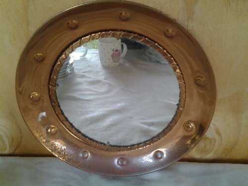 Round vintage copper wall mirror