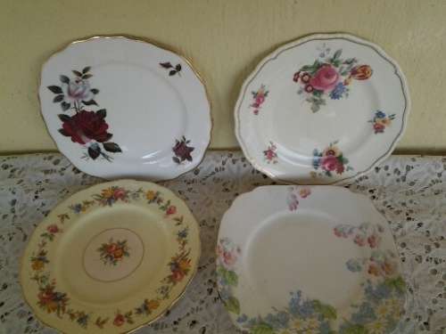 Assorted lot of six vintage porcelain side plates -- lot one