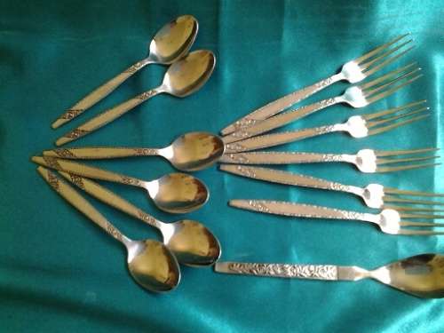 A nice lot of vintage stainless steel cake forks and tea spoons one long sugar spoon lot