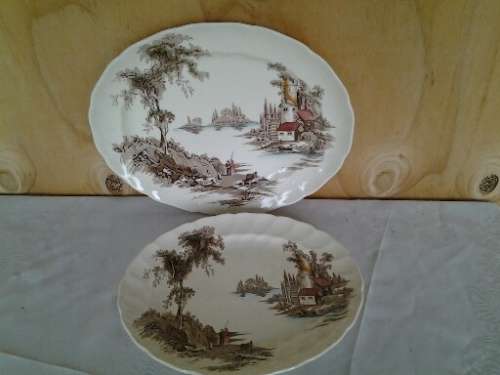 A pair of vintage Old mill scene porcelain serving platters