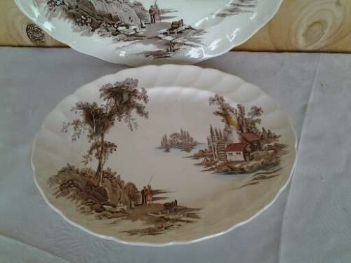 A pair of vintage Old mill scene porcelain serving platters