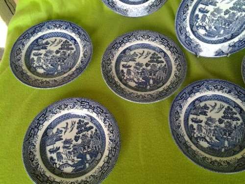 Ten stunning blue and white Churchill willow pattern side plates