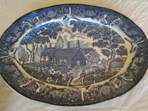 large blue and white vintage porcelain oval serving platter  with a country side scene