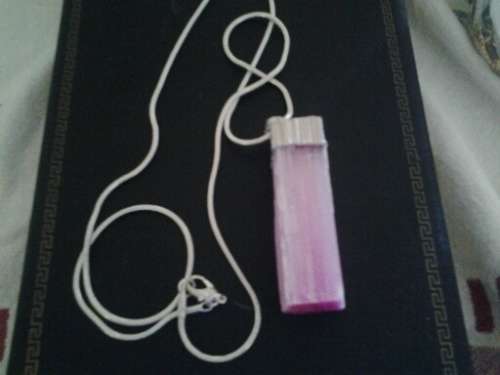 ladies costume necklace with a large pink semi precious stone pendant