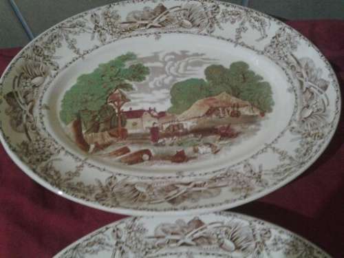 A pair of vintage porcelain Rural scene royal Staffordshire platters by clairce cliff