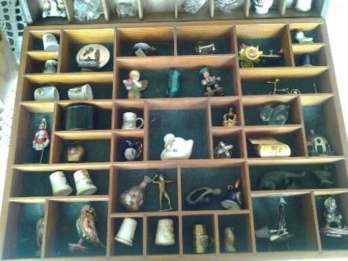 three assorted collectable printers trays with some ornaments all for one bid