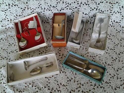 assorted lot of stainless steel cutlery items in there boxes