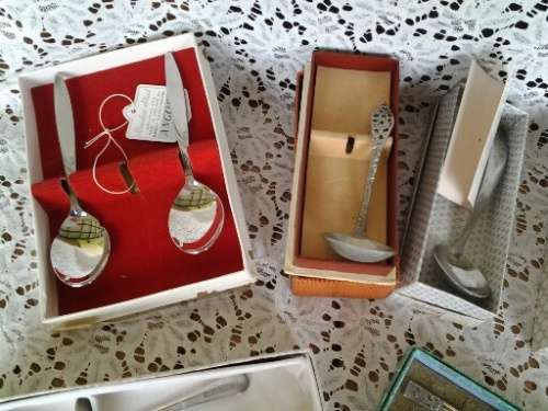 assorted lot of stainless steel cutlery items in there boxes