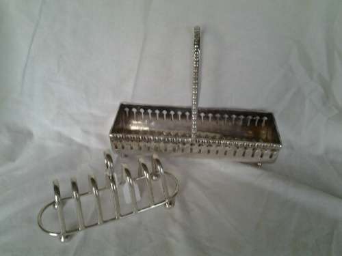 two vintage sliver plated items one toast rack one biscuit holder