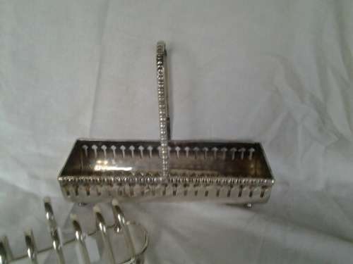 two vintage sliver plated items one toast rack one biscuit holder