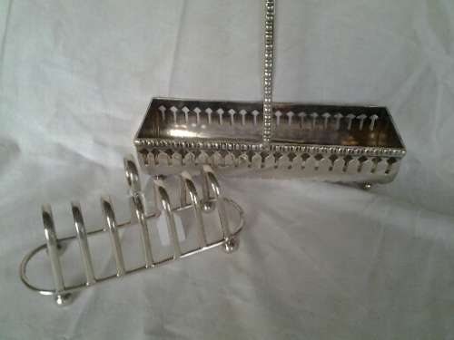 two vintage sliver plated items one toast rack one biscuit holder