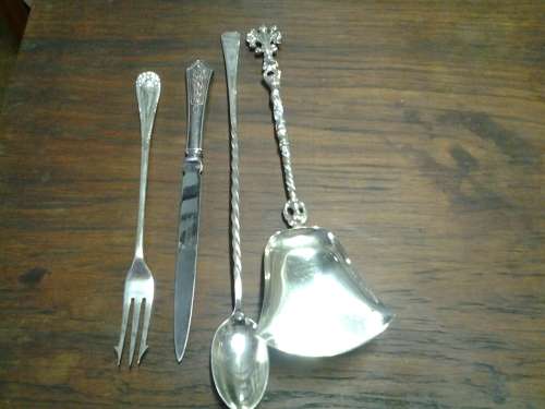 A selection of vintage four cultery items