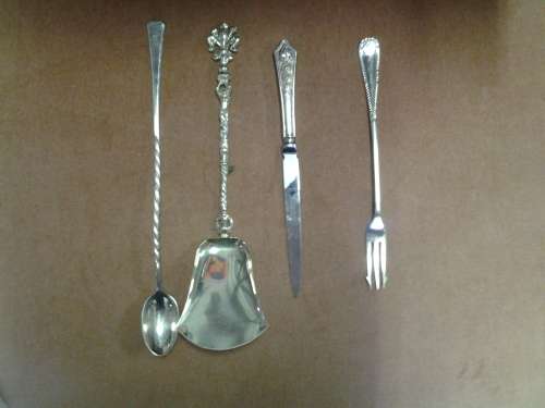 A selection of vintage four cultery items