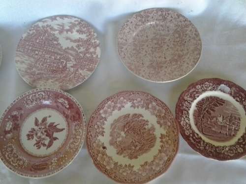 eight assorted pretty red and white porcelain side plates