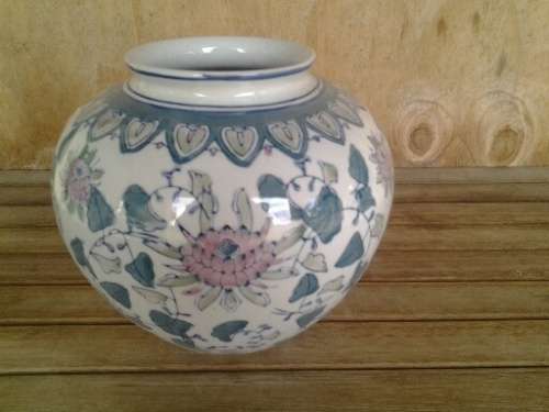 very nice porcelain decorative blue and white with a pink floral pattern bubble style vase