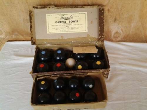 a lot of two boxed vintage carpet bowls