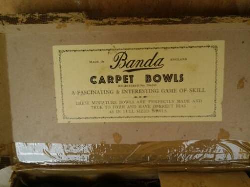 a lot of two boxed vintage carpet bowls